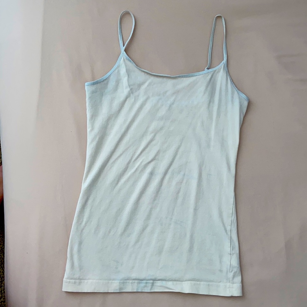 This is a creme color tanktop and is a size medium